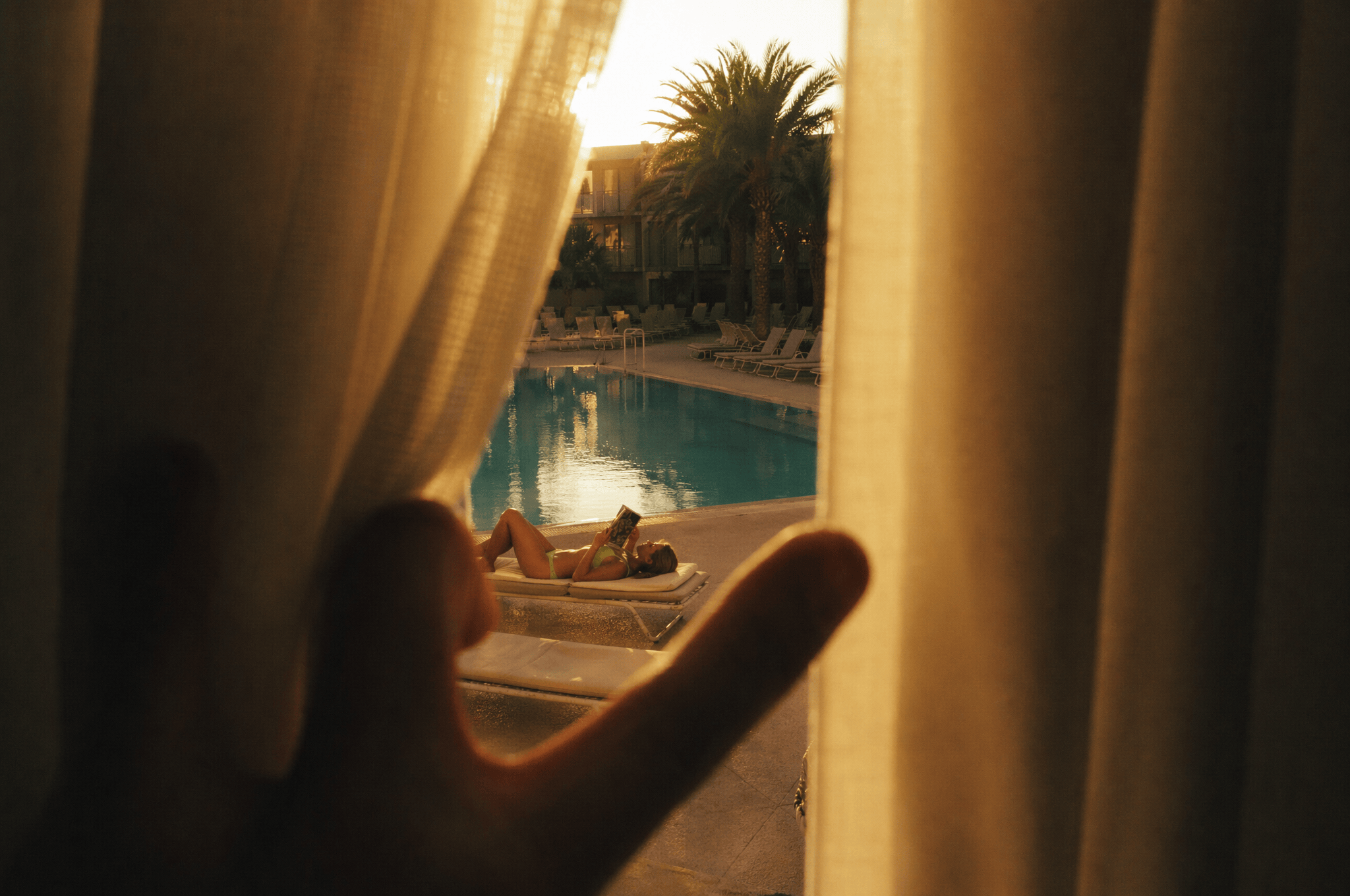 Hotel pool at sunset.